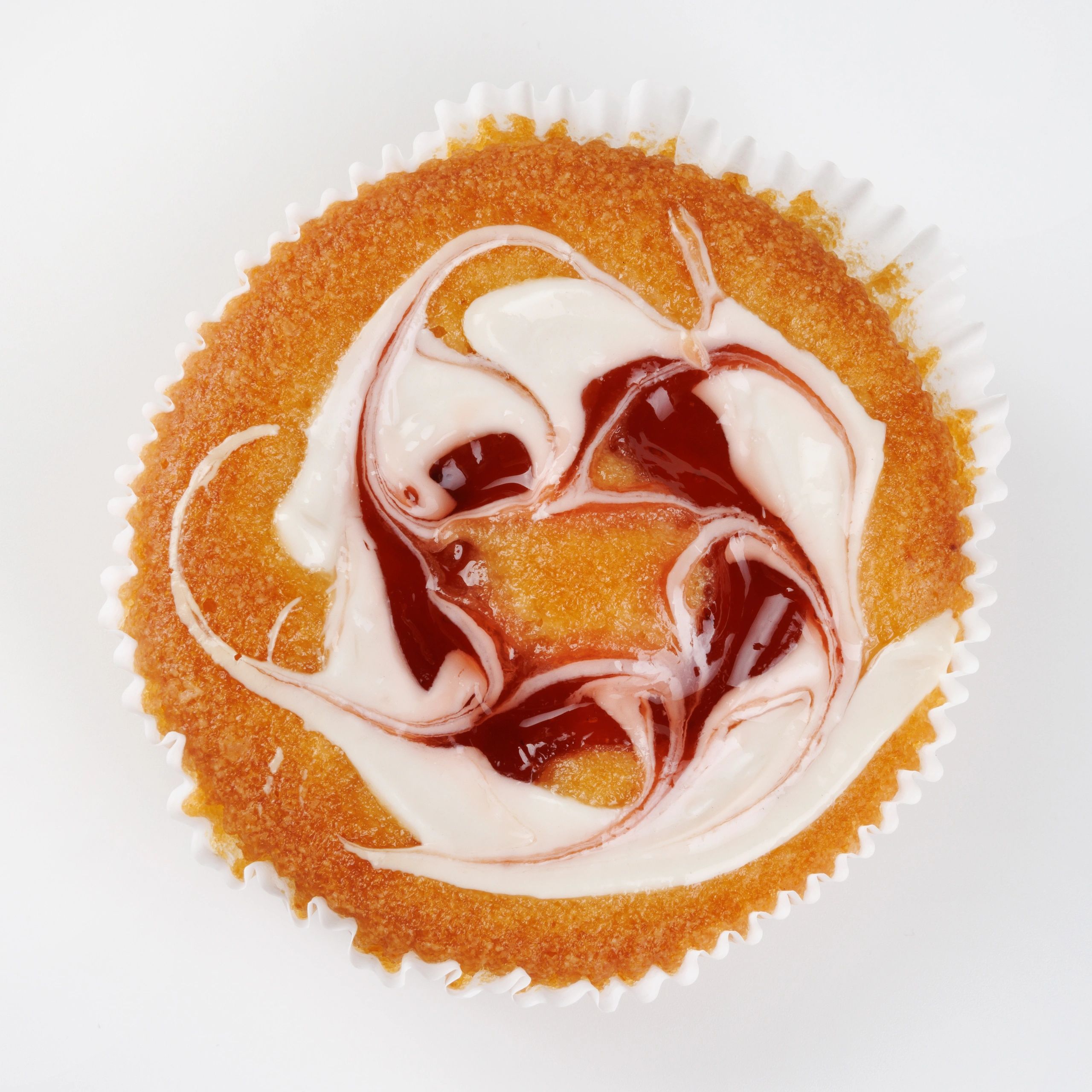 Beautiful sponge cake in a paper cup viewed from above